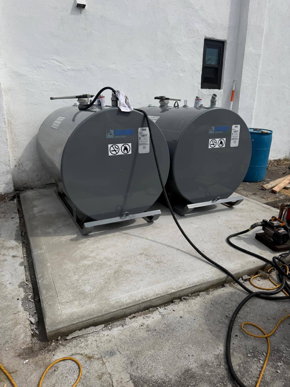 Granby steel oil tanks installed on a concrete pad on Long Island