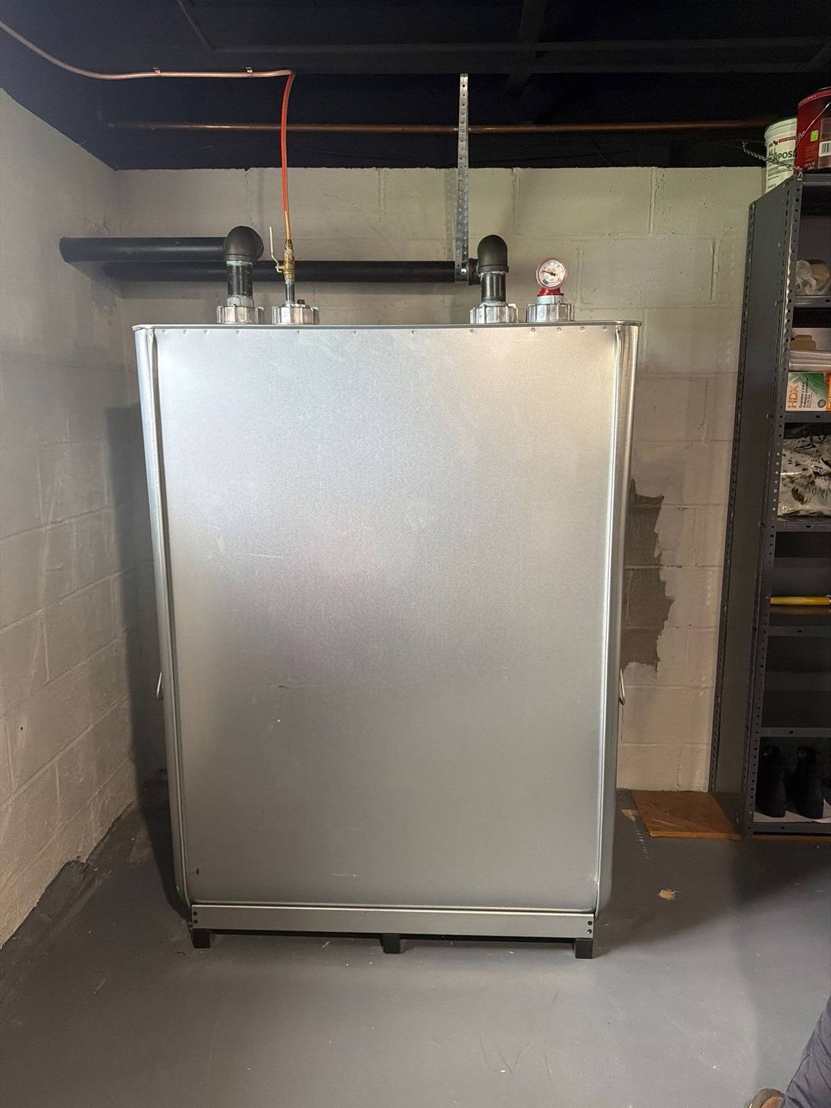 Emergency heating oil tank replacement completed in a Levittown basement
